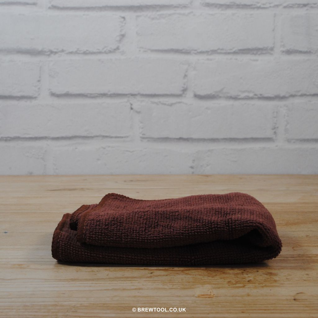 Folded Brown Crema Pro Barista Towel with Carabiner
