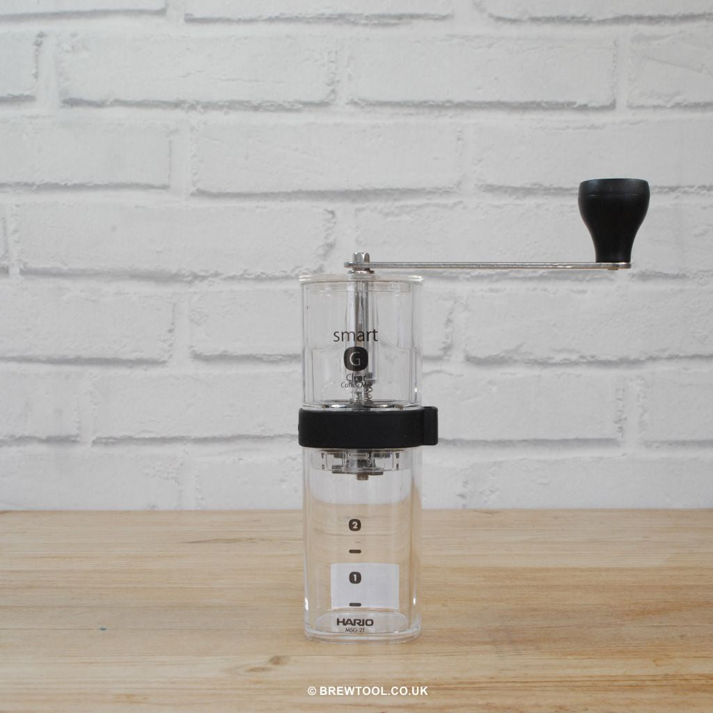 Hario Smart-G Manual Coffee Grinder with Handle Attached From Distance