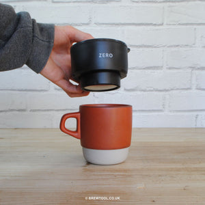 Trinity Zero Coffee Press Black Espresso Being Placed on Mug