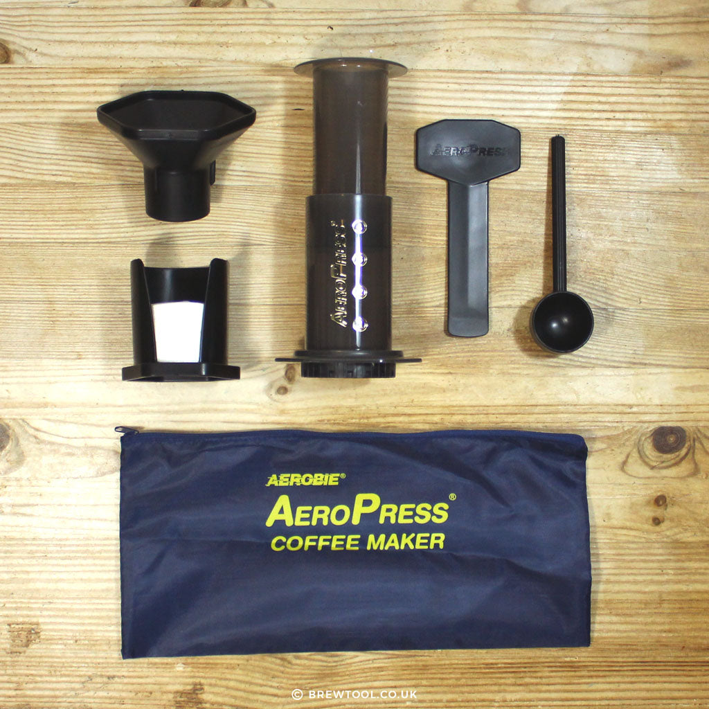 The AeroPress contents - A stirrer, spoon, filter set, tote bag and funnel that makes perfect coffee quickly with tasty results. Brewtool 